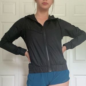 Black Nike zip up windbreaker with pockets NWOT